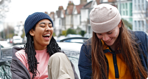 Two people smiling