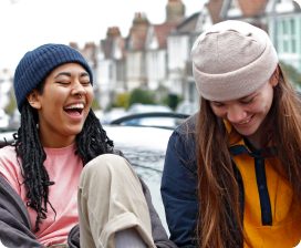 Two people smiling
