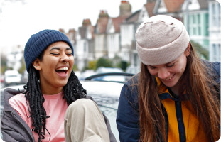 Two people smiling