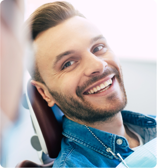 Man smiling at dentist.